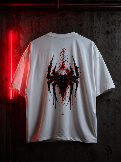 White t-shirt with a black and red spider graphic design on a dark background with red neon light.