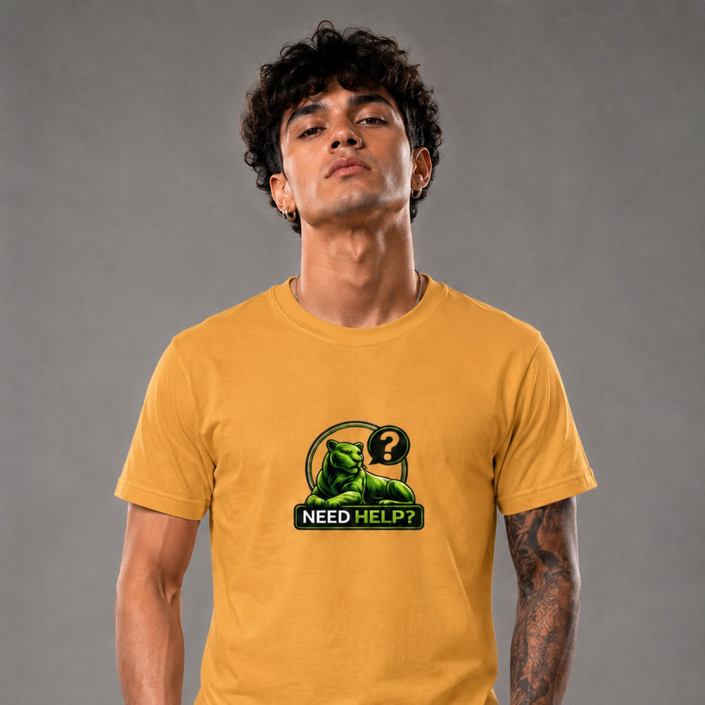 Person wearing a mustard yellow t-shirt with a graphic design on a gray background