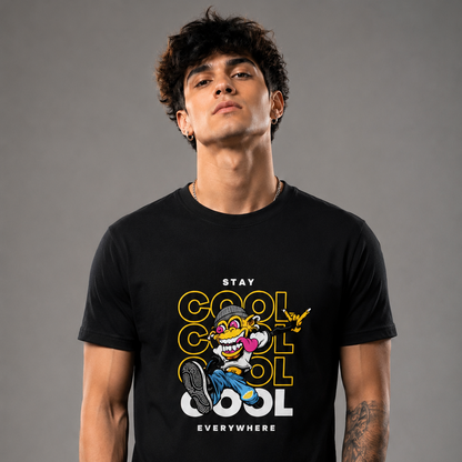 Person wearing a black t-shirt with a graphic design and text on a gray background